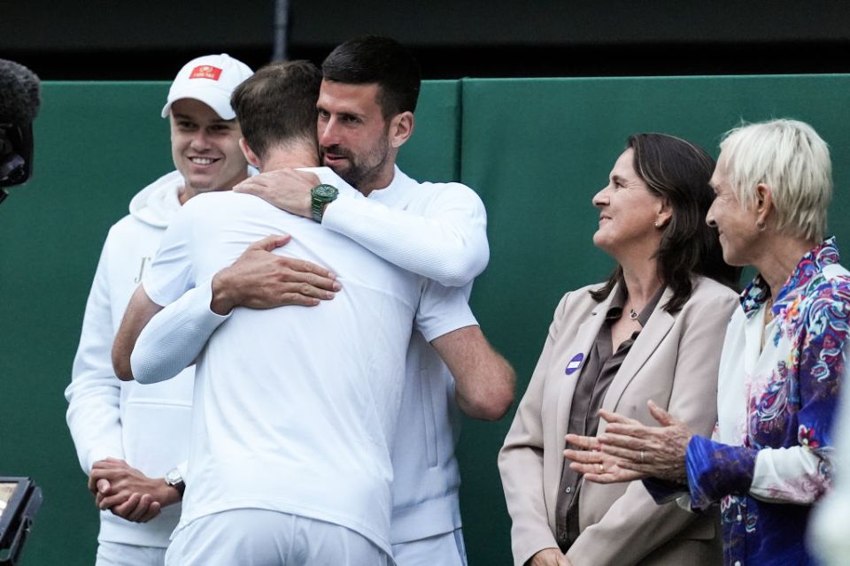 Murray embraces with Novak Djokovic as part of his farewell presentation at Wimbledon 2024