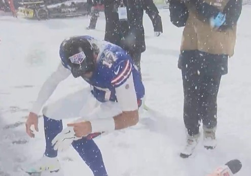 Allen agreed to do a snow angel with his head coach